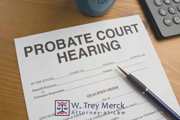a probate court hearing form and a pen on a desk